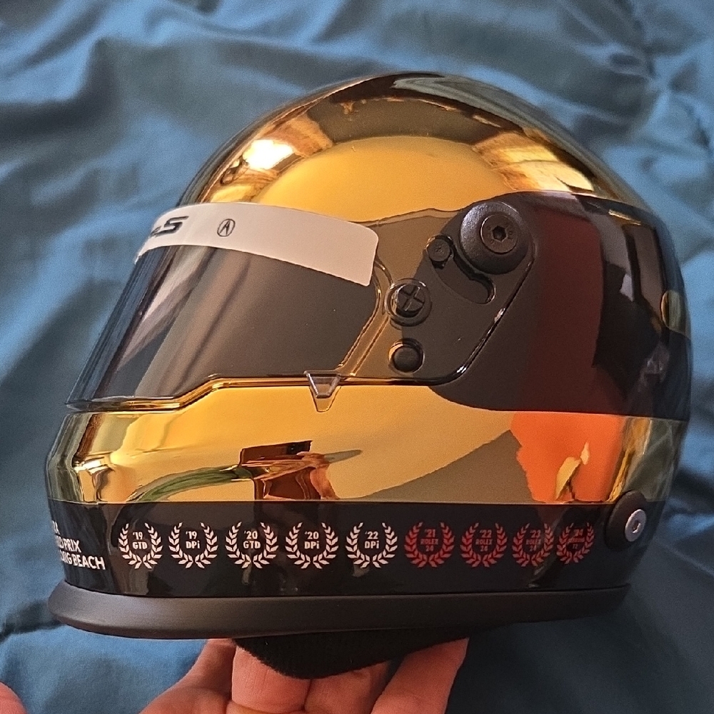 Gold and Black Collector's Racing Helmet